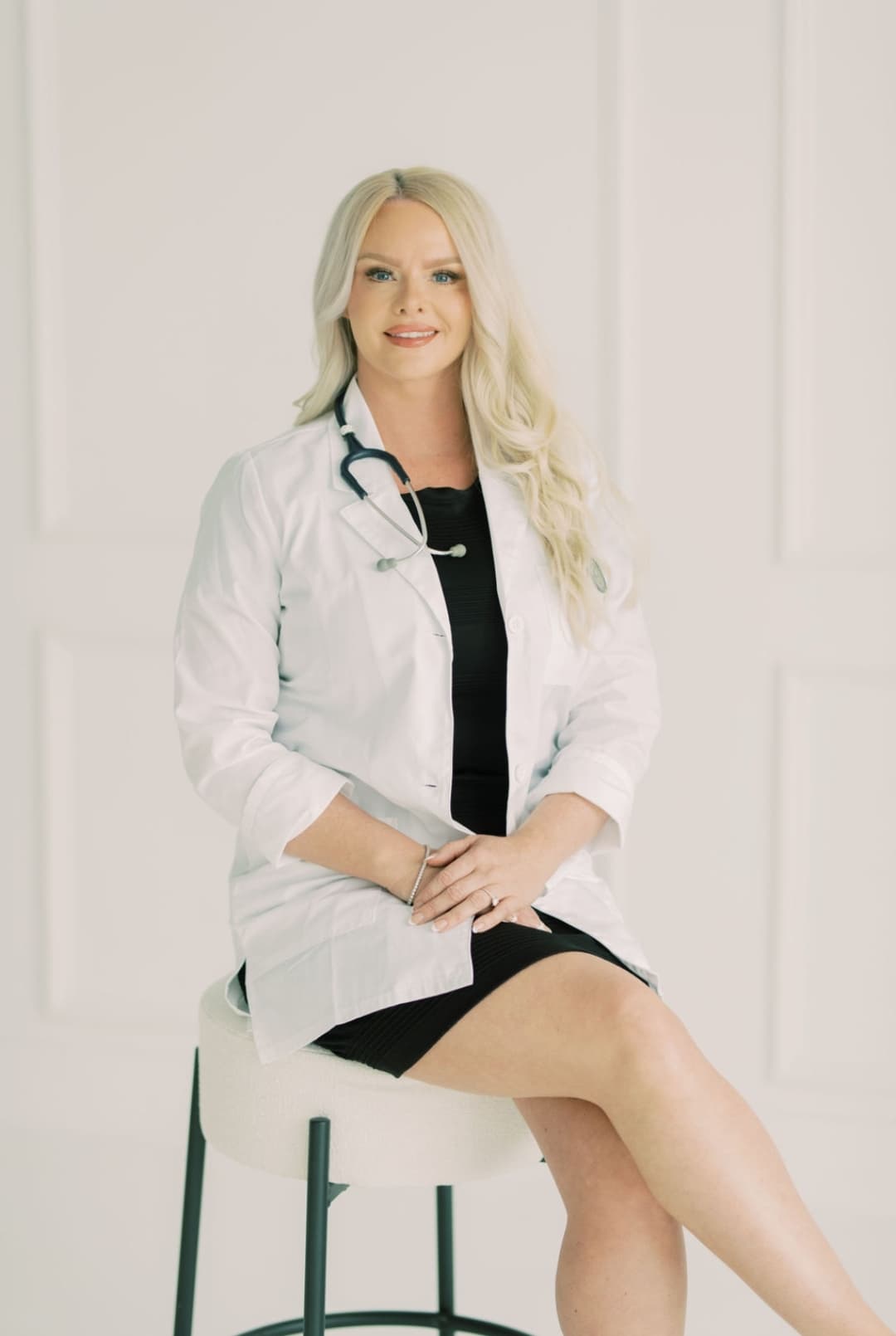 Crystal Troup, NP reviewing patient notes at Tier1 Optimal